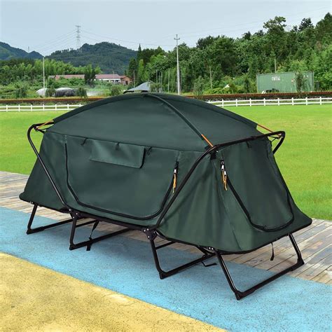 camping cots with tents attached.